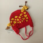 کلاه تک نوزادی تریکو بند دار گرم مدل عروسکی3 - تصویر 2