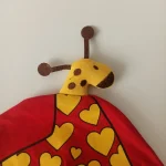 کلاه تک نوزادی تریکو بند دار گرم مدل عروسکی3 - تصویر 3