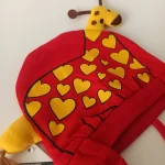 کلاه تک نوزادی تریکو بند دار گرم مدل عروسکی3 - تصویر 4